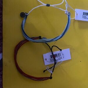 Two pura vida bracelets multi colored